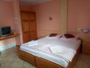 Postel nebo postele na pokoji v ubytování Hostel Bata