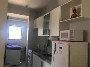 Una cocina o zona de cocina en Apartamento Praia de Pajucara