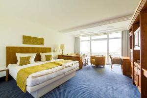 Postel nebo postele na pokoji v ubytování Hotel Reiterhof + 29 fotografií