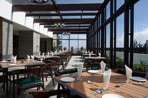 Restaurace v ubytování The Hamuse Hotel Kodaikanal - Luxury Redefined