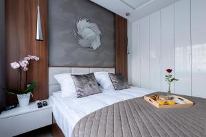 Postel nebo postele na pokoji v ubytování Apartament Modern