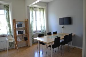 TV a/nebo společenská místnost v ubytování Sidsjö Hotell & Konferens