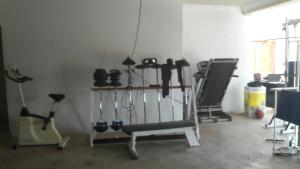 a room with a bunch of equipment in it at Lullaby Guesthouse in Tzaneen