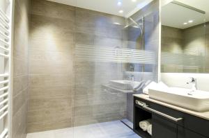 Koupelna v ubytování Hotel Garni Funtana