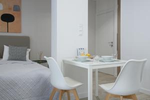 Posteľ alebo postele v izbe v ubytovaní Apple Green Apartments