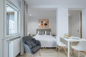 Posteľ alebo postele v izbe v ubytovaní Apple Green Apartments