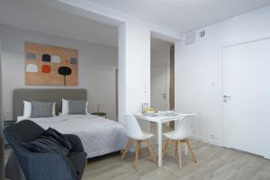 Posteľ alebo postele v izbe v ubytovaní Apple Green Apartments
