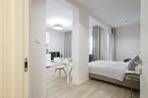 Posteľ alebo postele v izbe v ubytovaní Apple Green Apartments