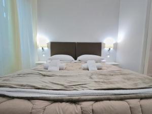 Ліжко або ліжка в номері Vatican Luxury Corner