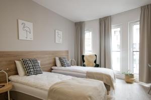 Posteľ alebo postele v izbe v ubytovaní Apple Green Apartments