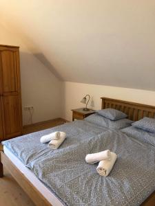 Posteľ alebo postele v izbe v ubytovaní Kristály Apartmanház