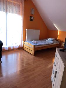Posteľ alebo postele v izbe v ubytovaní Kristály Apartmanház