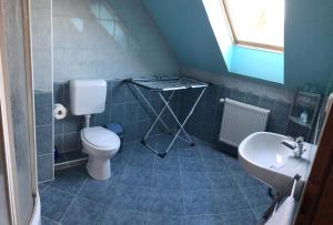 Kúpeľňa v ubytovaní Kristály Apartmanház