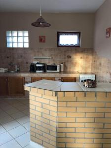 Kuchyňa alebo kuchynka v ubytovaní Kristály Apartmanház
