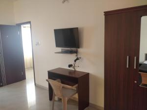 TV a/nebo společenská místnost v ubytování Tulip Suites