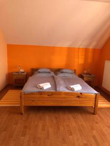 Posteľ alebo postele v izbe v ubytovaní Kristály Apartmanház