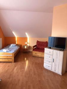 Posteľ alebo postele v izbe v ubytovaní Kristály Apartmanház