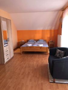 Posteľ alebo postele v izbe v ubytovaní Kristály Apartmanház