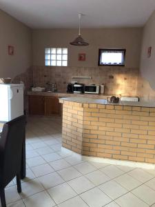 Kuchyňa alebo kuchynka v ubytovaní Kristály Apartmanház