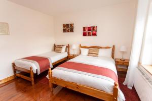 Letto o letti in una camera di Nellie Dee's - Room Only
