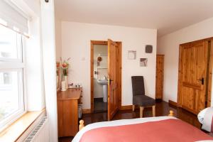 Letto o letti in una camera di Nellie Dee's - Room Only