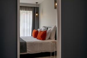 Uma cama ou camas num quarto em Sport Hotel Gym + SPA