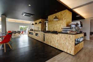 A cozinha ou kitchenette de Sport Hotel Gym + SPA