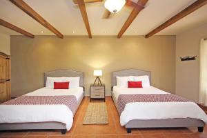 Postel nebo postele na pokoji v ubytování Los Establos Boutique Resort - All Inclusive