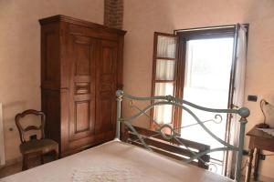 Krevet ili kreveti u jedinici u okviru objekta Agriturismo La Ca 'd Majin