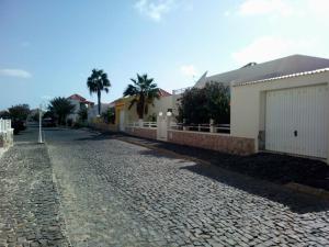 a cobblestone street in front of a house at Solmar apartment in Beirona