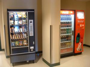 two vending machines are next to each other at University of Alberta - Accommodation in Edmonton