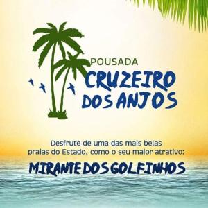 un cartello con una palma sulla spiaggia di Pousada Cruzeiro dos Anjos a Tabatinga