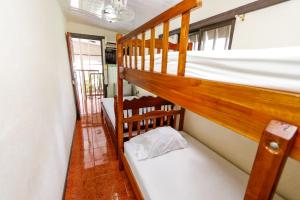 Postel nebo postele na pokoji v ubytování Hotel Flor Blanca