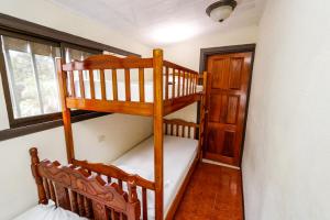 Postel nebo postele na pokoji v ubytování Hotel Flor Blanca