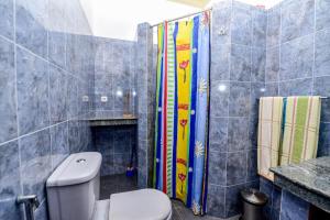 Ένα μπάνιο στο Simon's Lodge Hikkaduwa