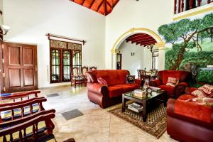 Χώρος καθιστικού στο Simon's Lodge Hikkaduwa