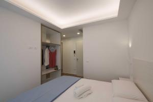 Llit o llits en una habitació de apARTments Sperlonga