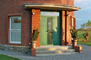 Eine Fassade oder ein Eingang zu Wasserturm Cuxhaven