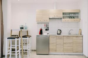 Kuchyňa alebo kuchynka v ubytovaní Exit Apartments