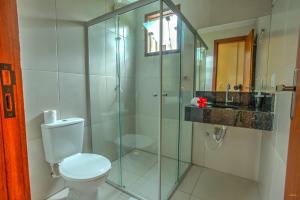 Bagno di i9 Embaú Flats & Suites