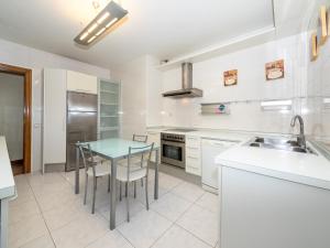 Kuchyňa alebo kuchynka v ubytovaní Gestión de Alojamientos Apartments