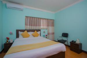 Hotel Golden Three客房内的一张或多张床位