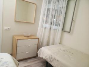 Postel nebo postele na pokoji v ubytování Benalmadena Costa Las Naciones