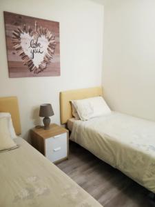 Postel nebo postele na pokoji v ubytování Benalmadena Costa Las Naciones