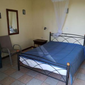 Posteľ alebo postele v izbe v ubytovaní Rigos Apartments