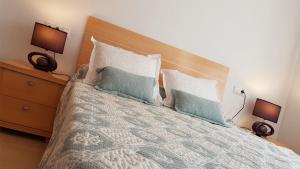 Cama ou camas em um quarto em Oasys Creek Apartment