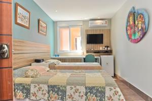 Voodi või voodid majutusasutuse Lapa Chêca Guest House toas