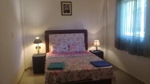 A bed or beds in a room at La Esperanza