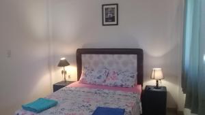 A bed or beds in a room at La Esperanza