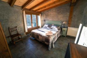 Katil atau katil-katil dalam bilik di Casa Rural El Huerto de la Fragua